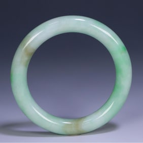 A Qing Dynasty natural jade old round bar bracelet