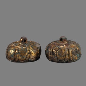 A pair of war Han copper tires gilt lotus petal seat town
