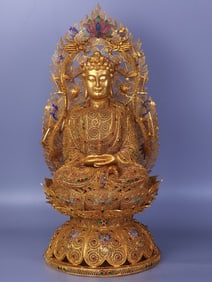 A copper-gilt silk Buddha of the Qing Dynasty