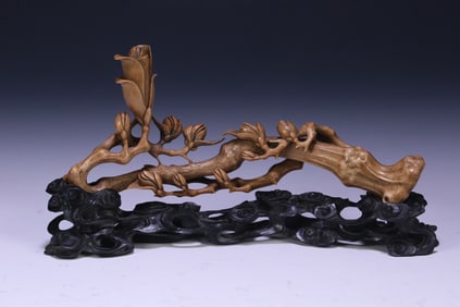A late Qing Dynasty old deer antler magnolia ornament