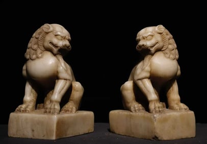A pair of white jade lions in the Ming Dynasty