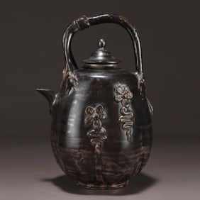 A Song Ding kiln black gold glazed vine flower pattern pot