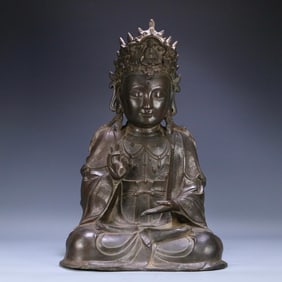 A bronze Guanyin seated statue of the Ming Dynasty