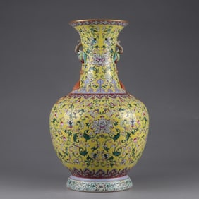 A Qing Qianlong yellow pastel floral pattern ruyi statue