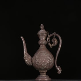 A sterling silver dragon wine jug