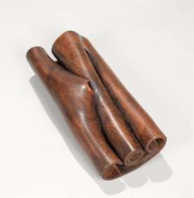 A Qing Dynasty book-style cinnamon western paperweight