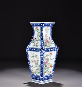 A Qing Qianlong blue and white consecrated pastel four-season flower and bird vase