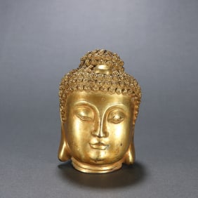 A copper gilt Buddha head of the Qing Dynasty