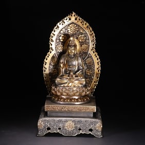 A Tibetan silver gilt Guanyin ornament