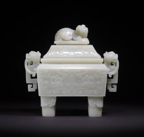 A white jade carved lion button gluttonous pattern square furnace of the Qing Dynasty is a treasured