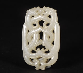 A jade double dragon pendant from the Qing Dynasty