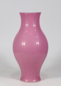 A carmine red melon olive bottle made in the Qing Yongzheng era