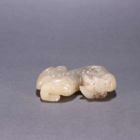 A Qing Dynasty Hetian jade beast carving
