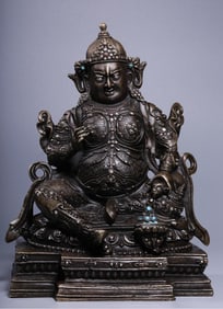 A Qing Dynasty box of gold, copper, silver, inlaid turquoise, and a statue of the King of Heaven