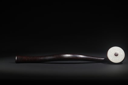 A Qing Dynasty rosewood inlaid jade ruyi study elegant vessel