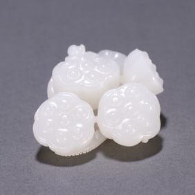 A Qing Dynasty Hetian jade seed material lotus pod carving