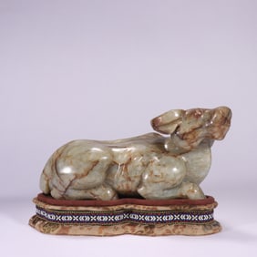 A piece of Qing Dynasty Hetian jade seed feed cow