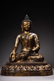 A statue of Shakyamuni Buddha in gold clay