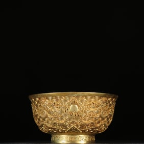 A Qing Dynasty copper gilt dragon pattern bowl