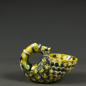 A piece of Tang Gong County kiln three-color duck beast wash