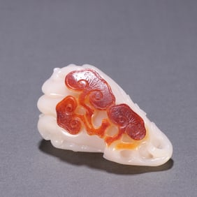 A piece of Qing Dynasty Hetian jade seed material left with skin and skillful carving - Ruyi