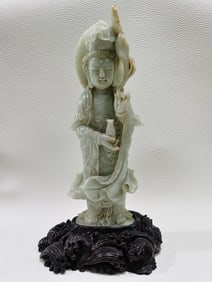 A statue of Qing Dynasty old jade Guanyin