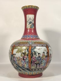 A Qing Qianlong enamel carmine red flower story appreciation vase