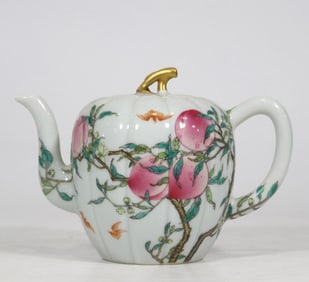 A Qing Qianlong era enamel color six peaches and five bat melon prism pots