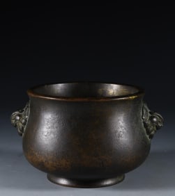 A Qing Dynasty copper beast ear furnace
