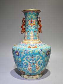 A Qianlong era of the Qing Dynasty enamel colored turquoise green ground Kuilong wearing a gold