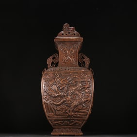 A Qing Dynasty agarwood dragon pattern appreciation bottle