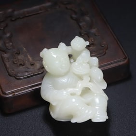 An old Hetian jade boy carving