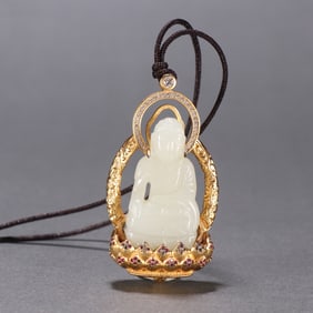 A Qing Dynasty Hetian jade-wrapped golden lotus Guanyin pendant