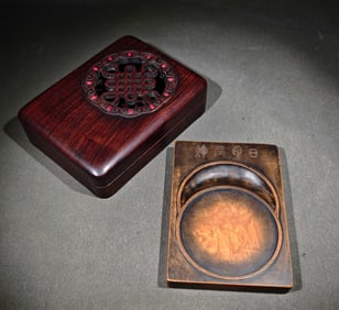 A Qianlong model ponderosa pine inkstone with a hollow inlaid gemstone mahogany box