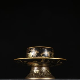A lacquerware gold-painted landscape landscape table