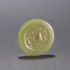 A Qing Dynasty Hetian topaz champion and first medal