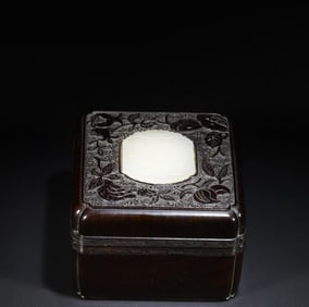 A Qing Dynasty mahogany inlaid white jade plaque lid box