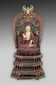 A seated statue of Shakyamuni Buddha painted in camphor wood in the Qing Dynasty
