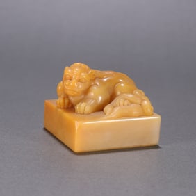 A Qing Dynasty Hetian jade auspicious beast button seal