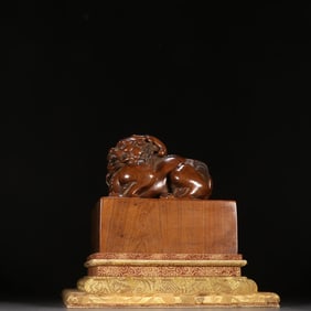 A Qing Dynasty sandalwood dragon button seal