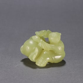 A Qing Dynasty Hetian topaz boy carving