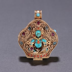 A Tibetan silver-gilt turquoise gemstone Gawu box