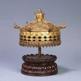 A Qing Dynasty Tibetan copper gilt umbrella cover