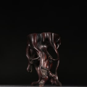 A Qing Dynasty small-leaved rosewood root-shaped base
