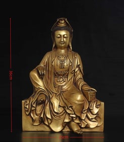 A copper gilt Guanyin ornament