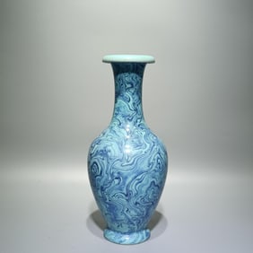 A Qing Qianlong style twisted glazed flip bottle