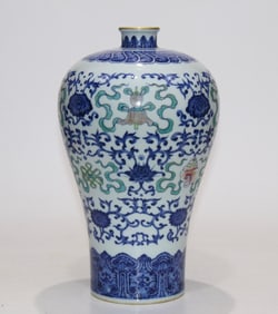 A blue and white bucket color dark eight treasure pattern plum bottle made in the Qing Yongzheng