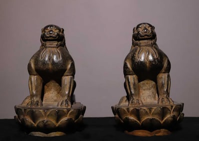 A pair  of Tang bluestone lotus lions