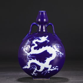 A Yuan Dynasty blue glaze blank carved cloud dragon pattern moon vase