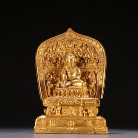 A Tibetan statue of a copper-gilt Sakya Guru